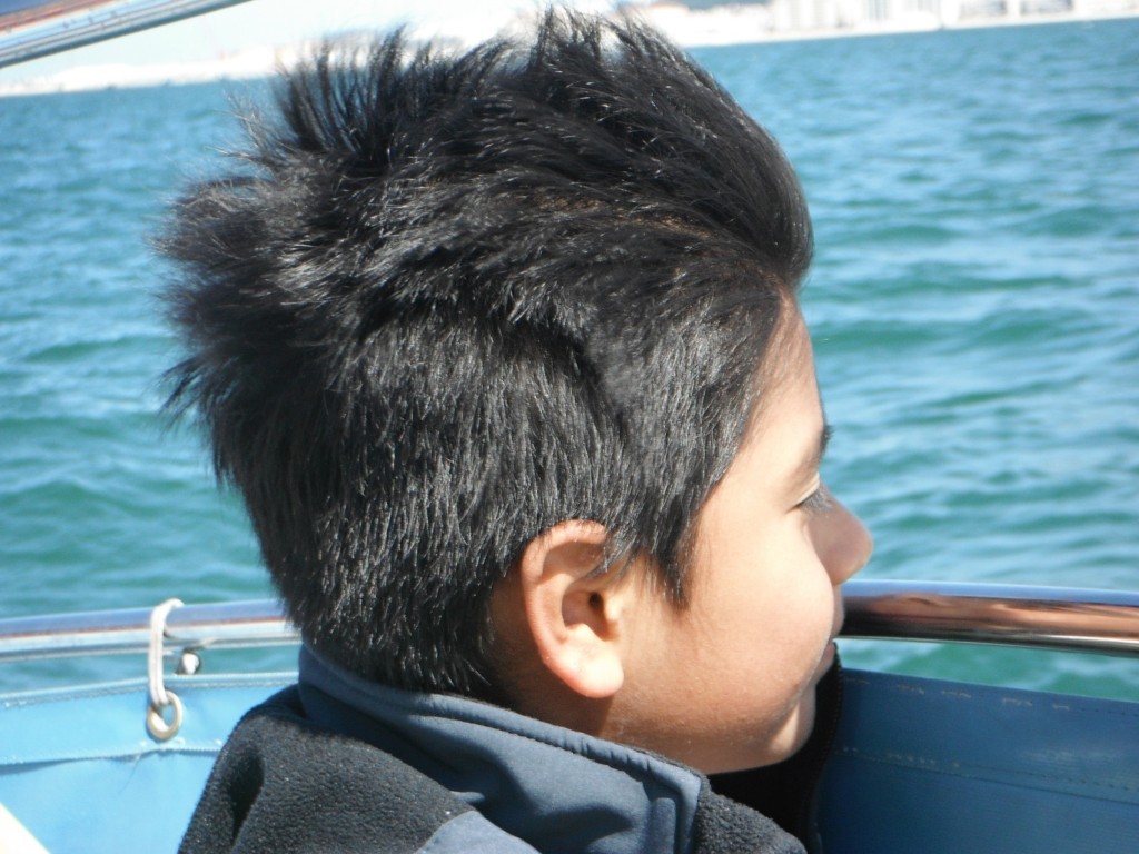 Luie on dolphin watching boat