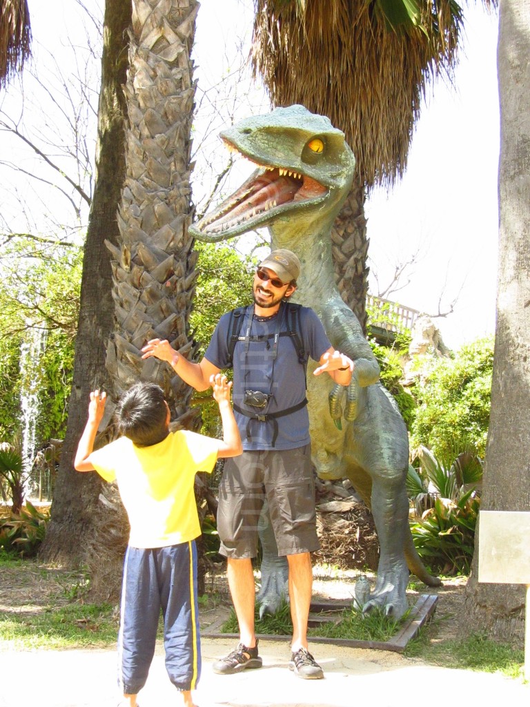 Posing with the dinosaur