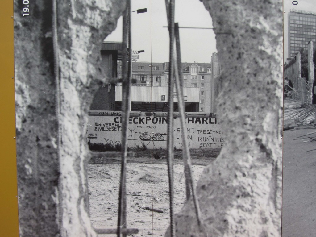 old photo looking through Berlin Wall