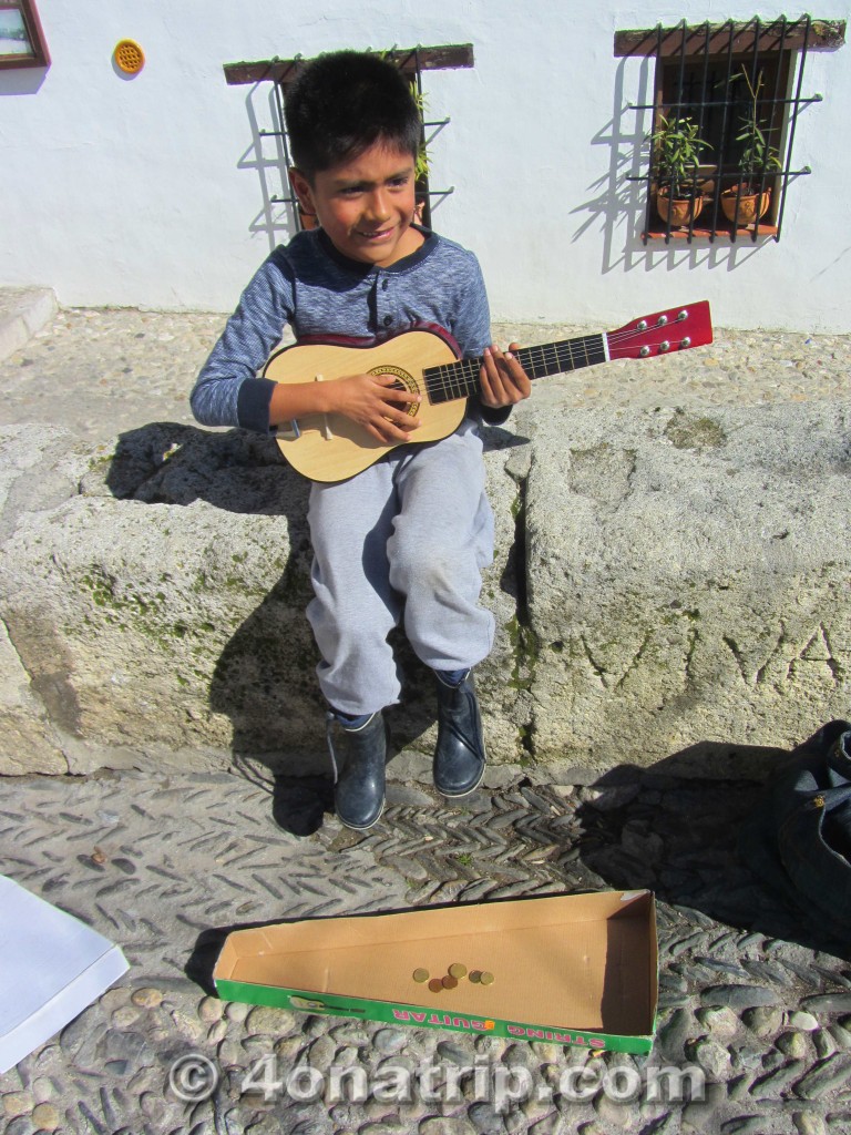 playing guitar to the plaza