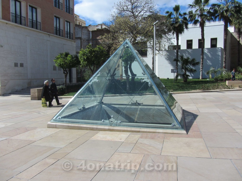 glass pyramid showing Roman ruins