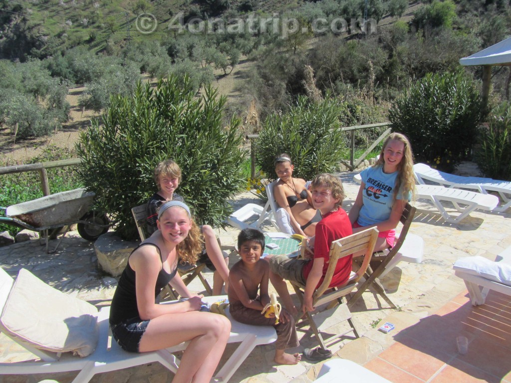 kids outside playing cards