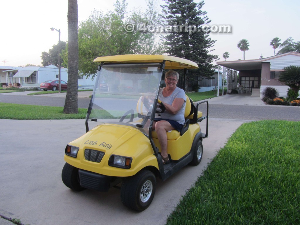 Rhea in golf cart